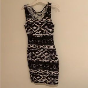 Black and white dress with detail on upper back.